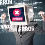 Man with Computer for head with "Error" on the screen