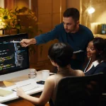 Developer Coding a Website Builder App